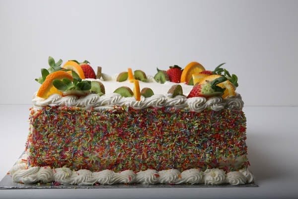 Fruit themed cake with hundreds and thousands from quigleys cafe, bakery and deli
