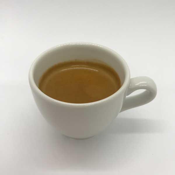 Espresso from Quigleys cafe, bakery and deli in a white espresso cup