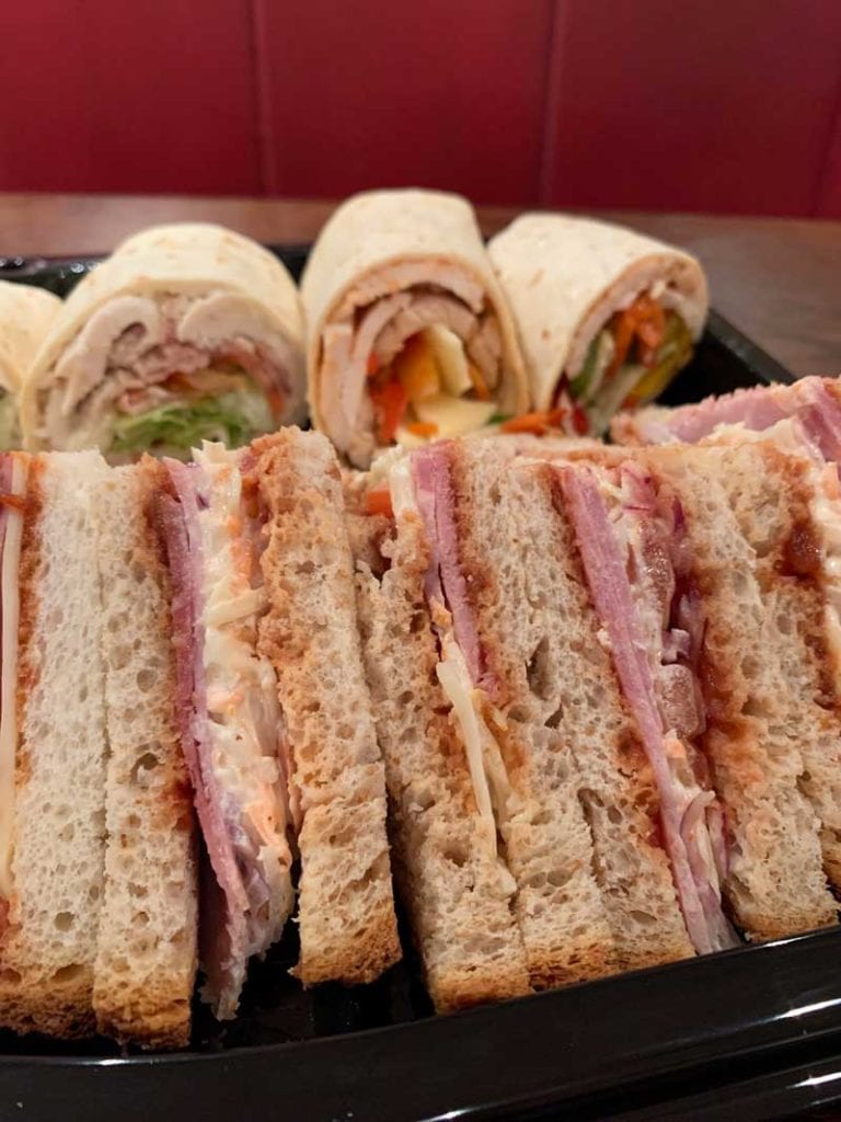 A selection of sandwiches and wraps on a catering platter available from Quigleys cafe, bakery and deli