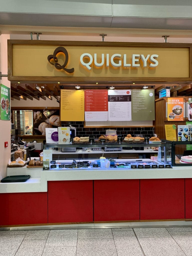 The deli counter and menus of Quigleys Cafe, bakery and deli in The Ilac Centre Dublin